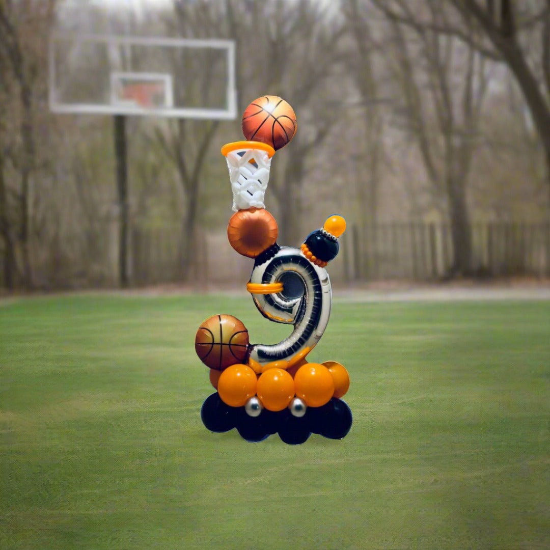 Basketball-themed balloon arrangement with a hoop and stars, perfect for birthdays and team celebrations.