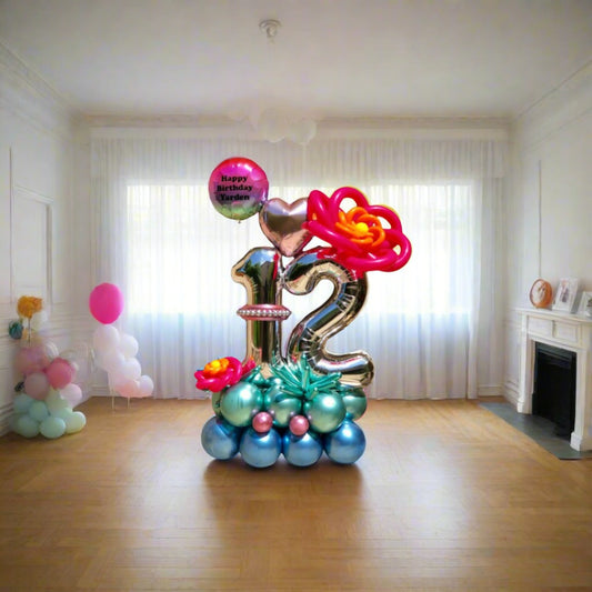 Flower Power balloon display with colorful flowers and a heart centerpiece, customizable with any number.