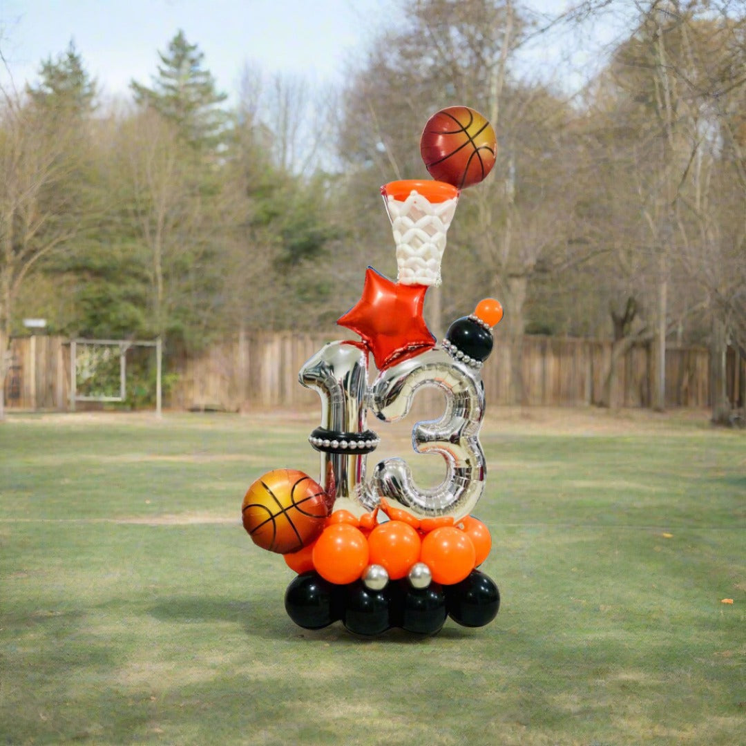 Dynamic balloon display with basketball-themed decor, ideal for sports parties.