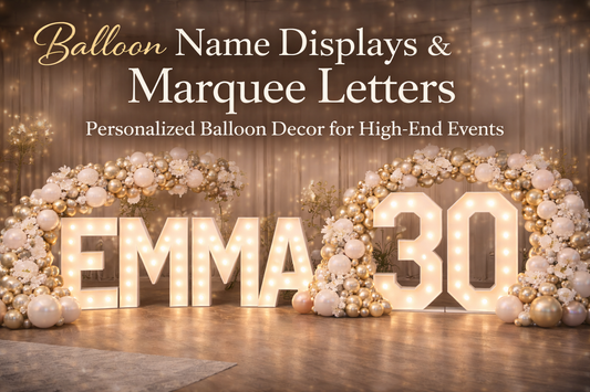 Luxury balloon name display with illuminated marquee letters and organic garland for high-end event celebration