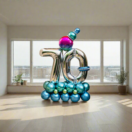 Festive Milestone balloon arrangement featuring vibrant, personalized balloons with a heart and custom message.